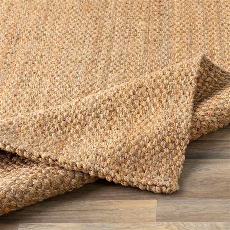It's been specifically engineered for high-traffic areas, with a heat-pressed 1/8" felt top backed by a natural, low-clay rubber blend specifically designed to withstand heavy foot traffic. . Lowes jute rug